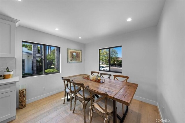 1834 Stearns Dr, Los Angeles, CA 90035 - dining area featuring healthy amount of natural light, recessed lighting, and light wood-type flooring