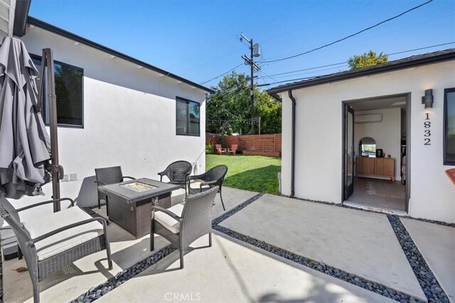 1834 Stearns Dr, Los Angeles, CA 90035 - view of patio with a fire pit