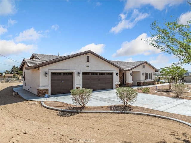15679 Tuscola Rd, Apple Valley, CA 92307 - ranch-style home with an attached garage, stucco siding, and a tile roof