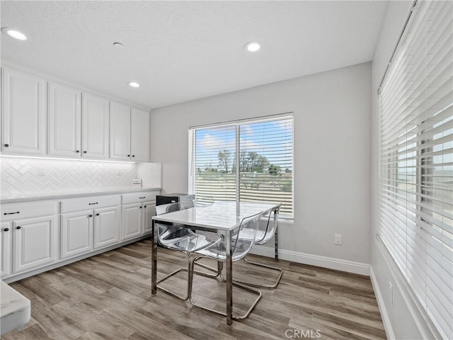 15679 Tuscola Rd, Apple Valley, CA 92307 - dining area featuring light wood finished floors and recessed lighting