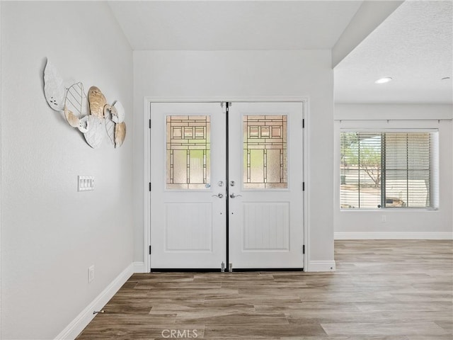 15679 Tuscola Rd, Apple Valley, CA 92307 - foyer entrance with baseboards and wood finished floors