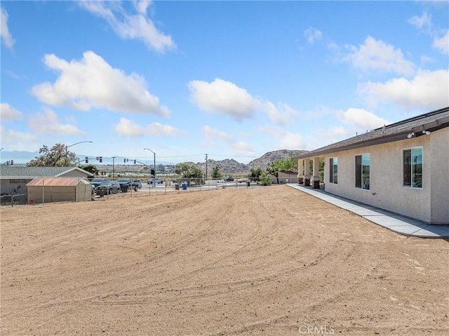 15679 Tuscola Rd, Apple Valley, CA 92307 - view of yard with a mountain view