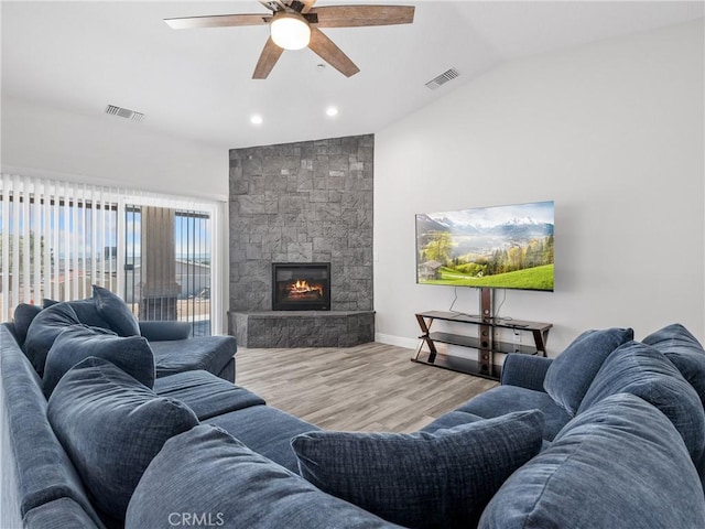 15679 Tuscola Rd, Apple Valley, CA 92307 - living room with a ceiling fan, wood finished floors, lofted ceiling, a fireplace, and recessed lighting