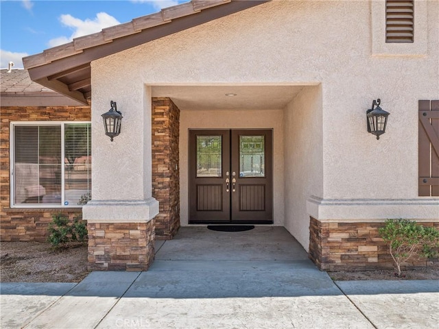 15679 Tuscola Rd, Apple Valley, CA 92307 - entrance to property featuring stone siding, french doors, and stucco siding