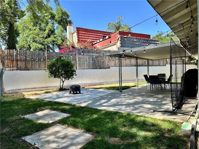 27820 Ferguson Dr, Castaic, CA 91384 - fenced backyard featuring a patio and outdoor dining area