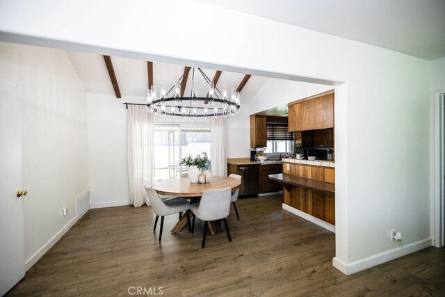 27820 Ferguson Dr, Castaic, CA 91384 - dining space with a chandelier and dark wood-type flooring