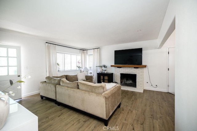 27820 Ferguson Dr, Castaic, CA 91384 - living area with wood finished floors and a fireplace