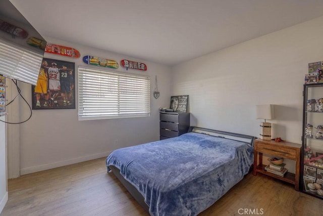 27820 Ferguson Dr, Castaic, CA 91384 - bedroom with wood finished floors and baseboards