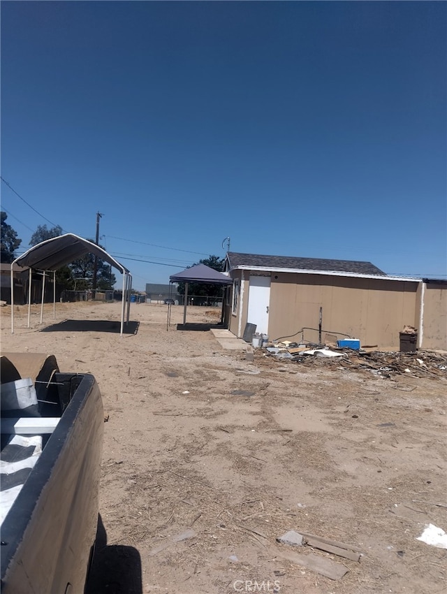 35021 Birch Rd, Barstow, CA 92311 - view of yard with a carport