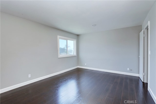 6804 Elm, Cypress, CA 90630 - unfurnished bedroom featuring baseboards and dark wood-style flooring