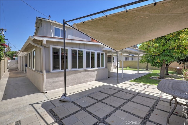 6804 Elm, Cypress, CA 90630 - back of property with a patio, a fenced backyard, and a gate