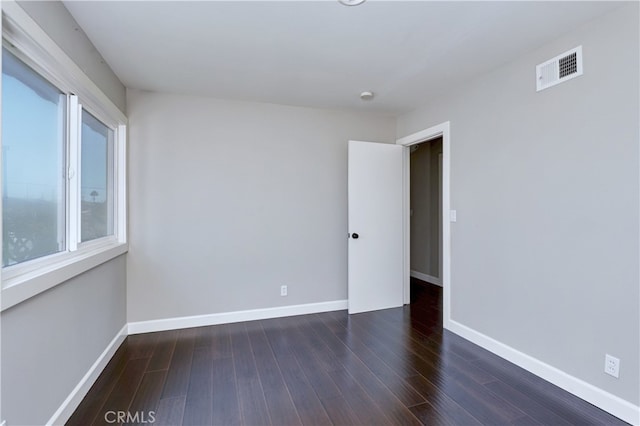 6804 Elm, Cypress, CA 90630 - empty room featuring dark wood finished floors and a smoke detector