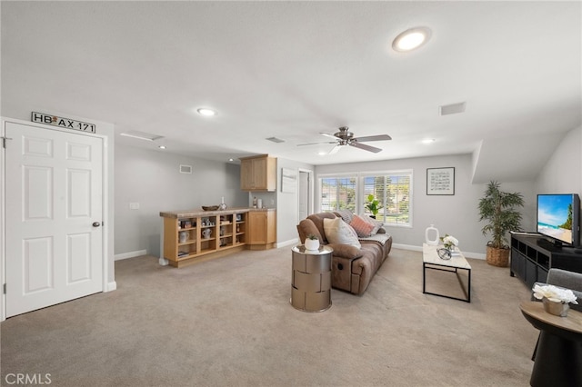 16660 Spruce Cir, Fountain Valley, CA 92708 - living room with light colored carpet, recessed lighting, and a ceiling fan