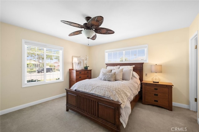 16660 Spruce Cir, Fountain Valley, CA 92708 - bedroom featuring light colored carpet and ceiling fan