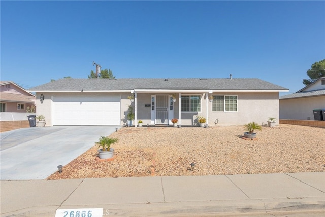 26866 Oakmont Dr, Menifee, CA 92586 - ranch-style house with an attached garage, concrete driveway, stucco siding, and a porch