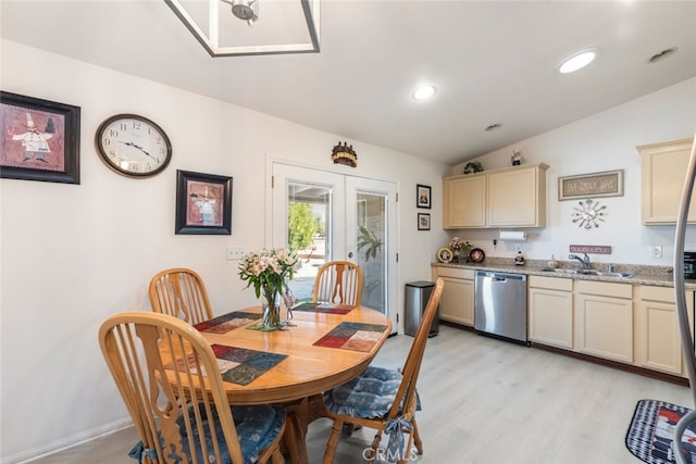 26866 Oakmont Dr, Menifee, CA 92586 - dining area featuring french doors, light wood-style flooring, vaulted ceiling, and recessed lighting