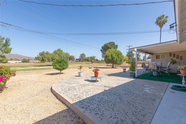 26866 Oakmont Dr, Menifee, CA 92586 - view of yard with a patio area and a mountain view