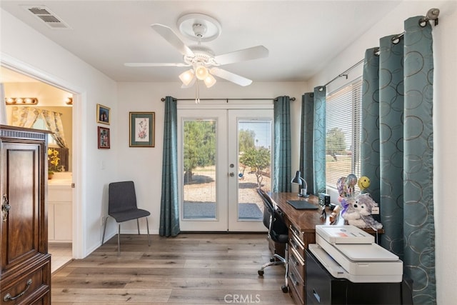 26866 Oakmont Dr, Menifee, CA 92586 - office area with french doors, light wood-style flooring, and a ceiling fan