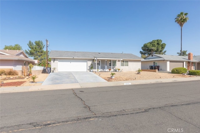 26866 Oakmont Dr, Menifee, CA 92586 - single story home with driveway, an attached garage, and stucco siding