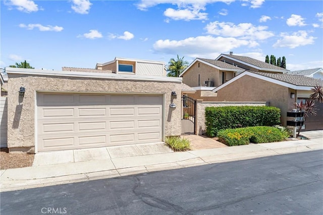 28082 Palmetto Ct, Laguna Niguel, CA 92677 - view of front of property with an attached garage, stucco siding, and concrete driveway