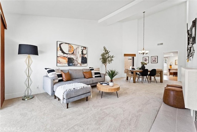28082 Palmetto Ct, Laguna Niguel, CA 92677 - living area with a chandelier, light carpet, light tile patterned flooring, and high vaulted ceiling