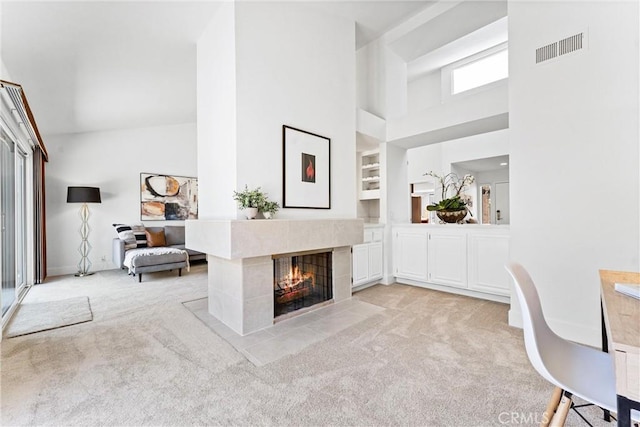 28082 Palmetto Ct, Laguna Niguel, CA 92677 - office with a high ceiling, light carpet, a tile fireplace, and built in features