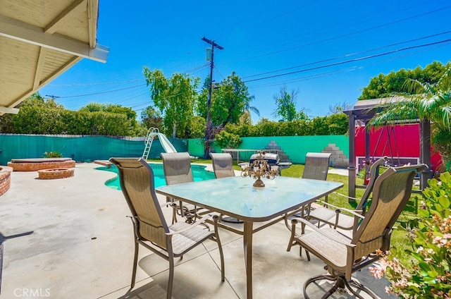 20606 Skouras Dr, Winnetka, CA 91306 - fenced backyard featuring outdoor dining space and a patio area
