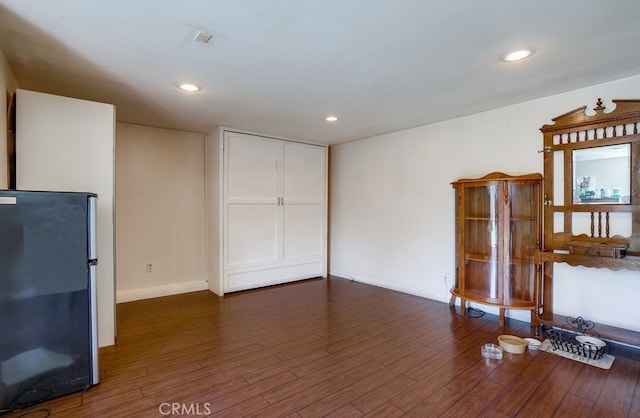20606 Skouras Dr, Winnetka, CA 91306 - unfurnished living room featuring dark wood finished floors and recessed lighting