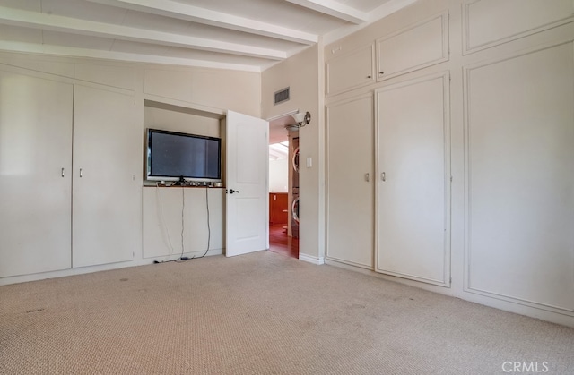 20606 Skouras Dr, Winnetka, CA 91306 - unfurnished bedroom with beam ceiling and light colored carpet