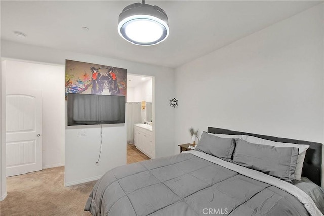 16502 Casa Grande Ave Unit 413, Fontana, CA 92336 - bedroom with light colored carpet and connected bathroom
