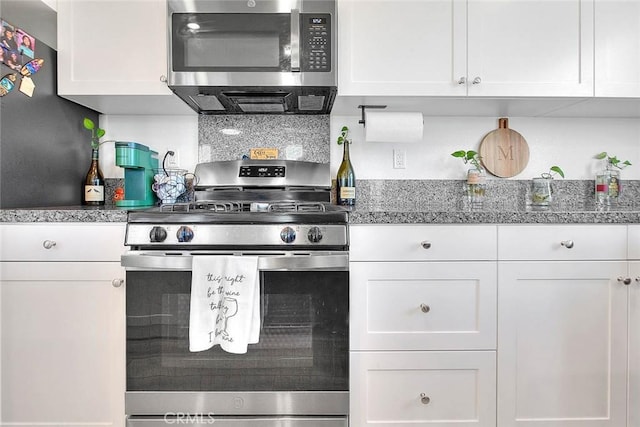 16502 Casa Grande Ave Unit 413, Fontana, CA 92336 - kitchen with stainless steel appliances and white cabinets