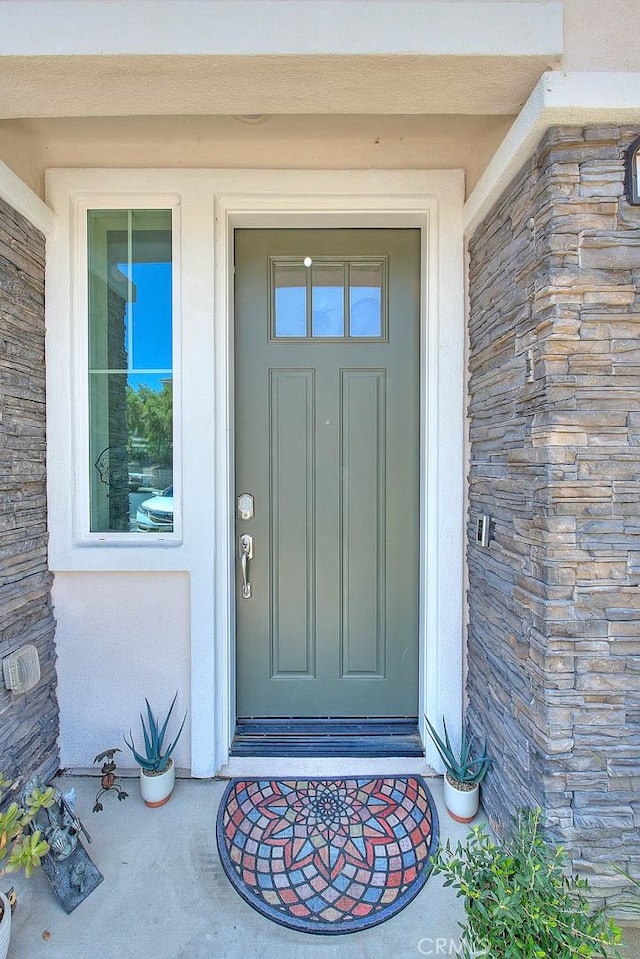 16502 Casa Grande Ave Unit 413, Fontana, CA 92336 - doorway to property with stone siding