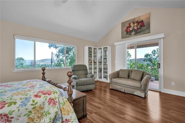 19040 Redbud Rd, Hidden Valley Lake, CA 95467 - bedroom featuring access to outside, lofted ceiling, multiple windows, and wood finished floors