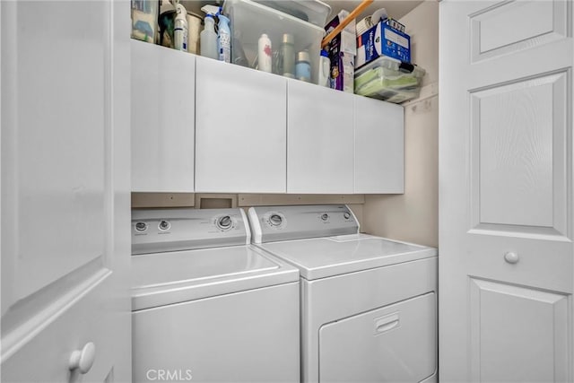 19040 Redbud Rd, Hidden Valley Lake, CA 95467 - laundry area with cabinet space and separate washer and dryer