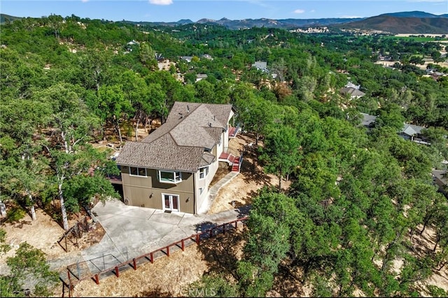19040 Redbud Rd, Hidden Valley Lake, CA 95467 - view of subject property featuring mountains and a heavily wooded area