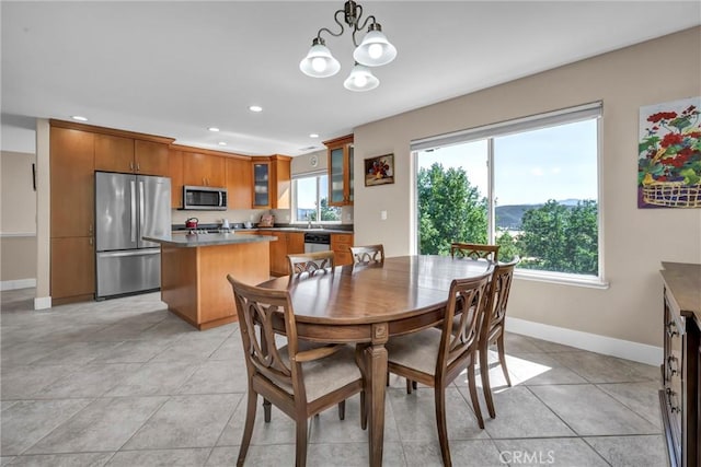 19040 Redbud Rd, Hidden Valley Lake, CA 95467 - dining room featuring recessed lighting, a chandelier, and light tile patterned floors