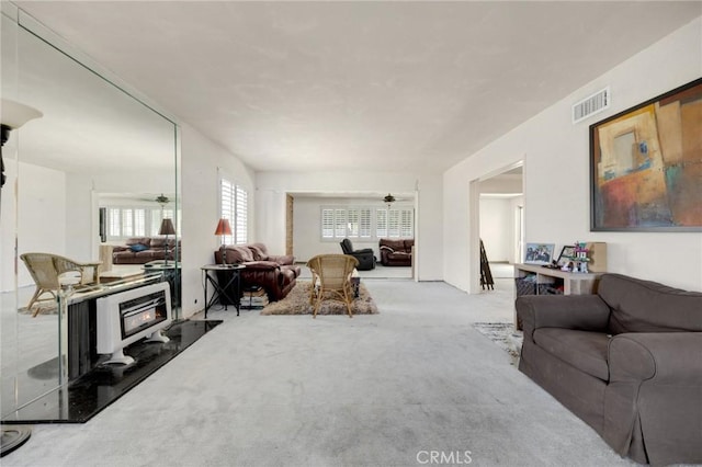 1411 Woodcrest Ave, La Habra, CA 90631 - living area with carpet and ceiling fan