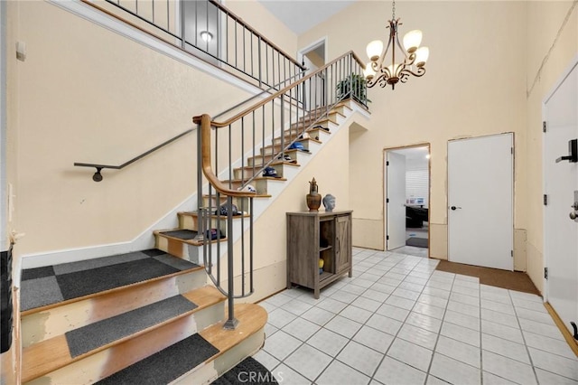 1411 Woodcrest Ave, La Habra, CA 90631 - foyer with stairway, a chandelier, a towering ceiling, and light tile patterned floors
