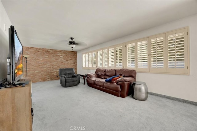 1411 Woodcrest Ave, La Habra, CA 90631 - living area with carpet flooring and brick wall