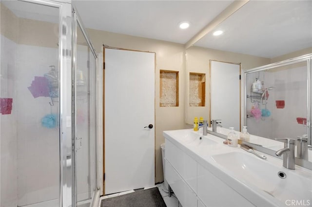 1411 Woodcrest Ave, La Habra, CA 90631 - bathroom with a shower stall, double vanity, and recessed lighting
