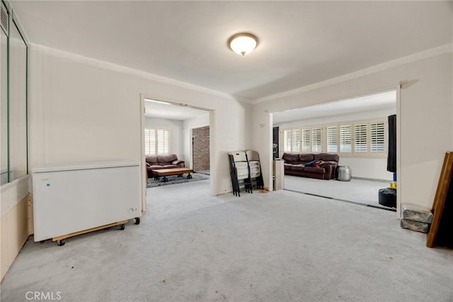 1411 Woodcrest Ave, La Habra, CA 90631 - spare room featuring carpet flooring and ornamental molding