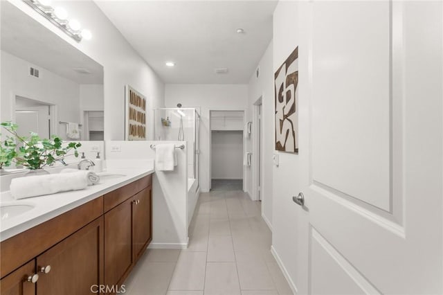 13028 Central Ave Unit 202, Hawthorne, CA 90250 - full bath with a shower stall, tile patterned flooring, double vanity, and a tub