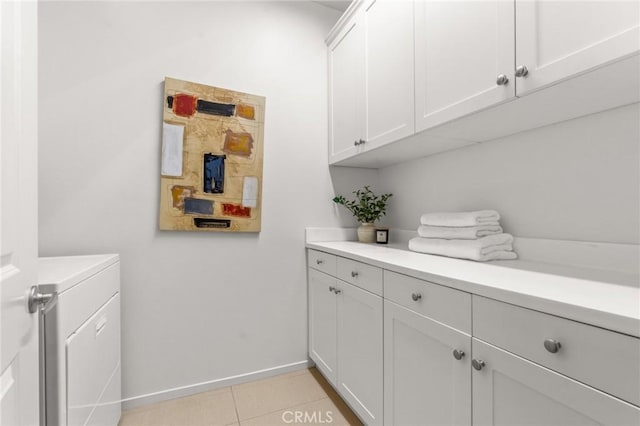 13028 Central Ave Unit 202, Hawthorne, CA 90250 - washroom with cabinet space, independent washer and dryer, and light tile patterned floors
