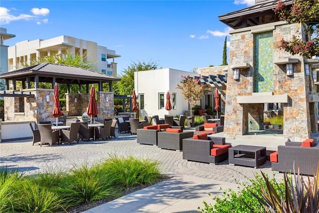 13028 Central Ave Unit 202, Hawthorne, CA 90250 - view of patio / terrace featuring an outdoor hangout area and a gazebo