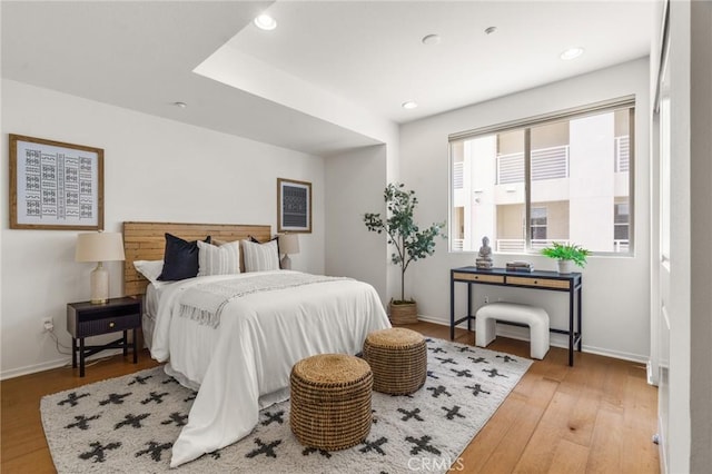 13028 Central Ave Unit 202, Hawthorne, CA 90250 - bedroom with hardwood / wood-style flooring and recessed lighting