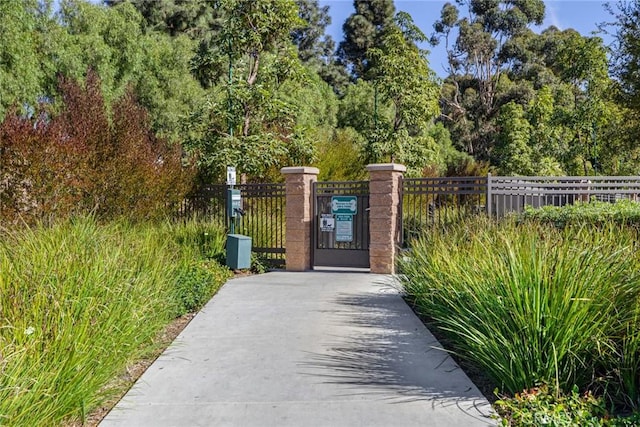 13028 Central Ave Unit 202, Hawthorne, CA 90250 - gate featuring view of scattered trees