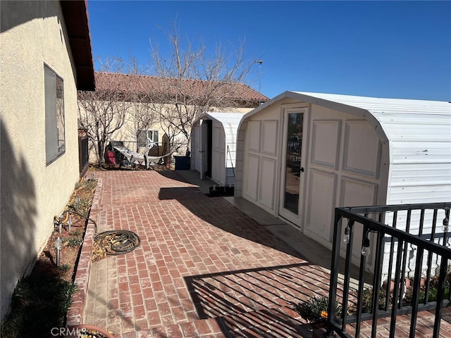 9535 Timberlane Ave, Hesperia, CA 92345 - view of patio / terrace featuring a storage shed