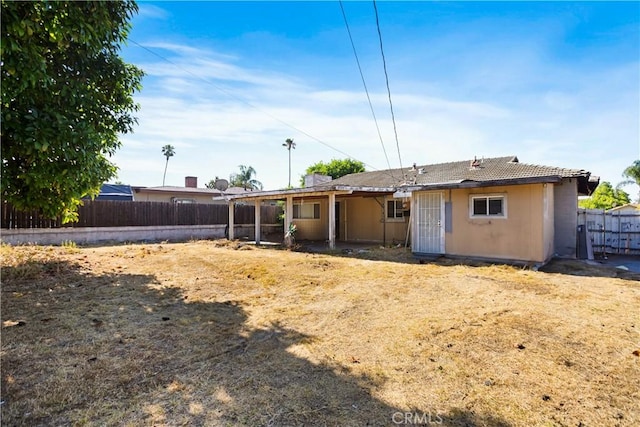 1811 Elaine St, Pomona, CA 91767 - rear view of property featuring a fenced backyard