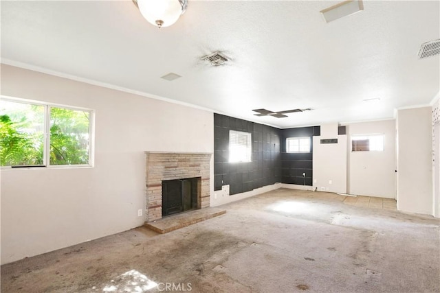 1811 Elaine St, Pomona, CA 91767 - unfurnished living room featuring crown molding, a stone fireplace, and carpet