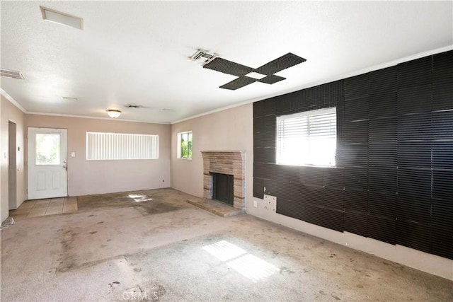 1811 Elaine St, Pomona, CA 91767 - unfurnished living room with plenty of natural light, ornamental molding, carpet flooring, and a fireplace